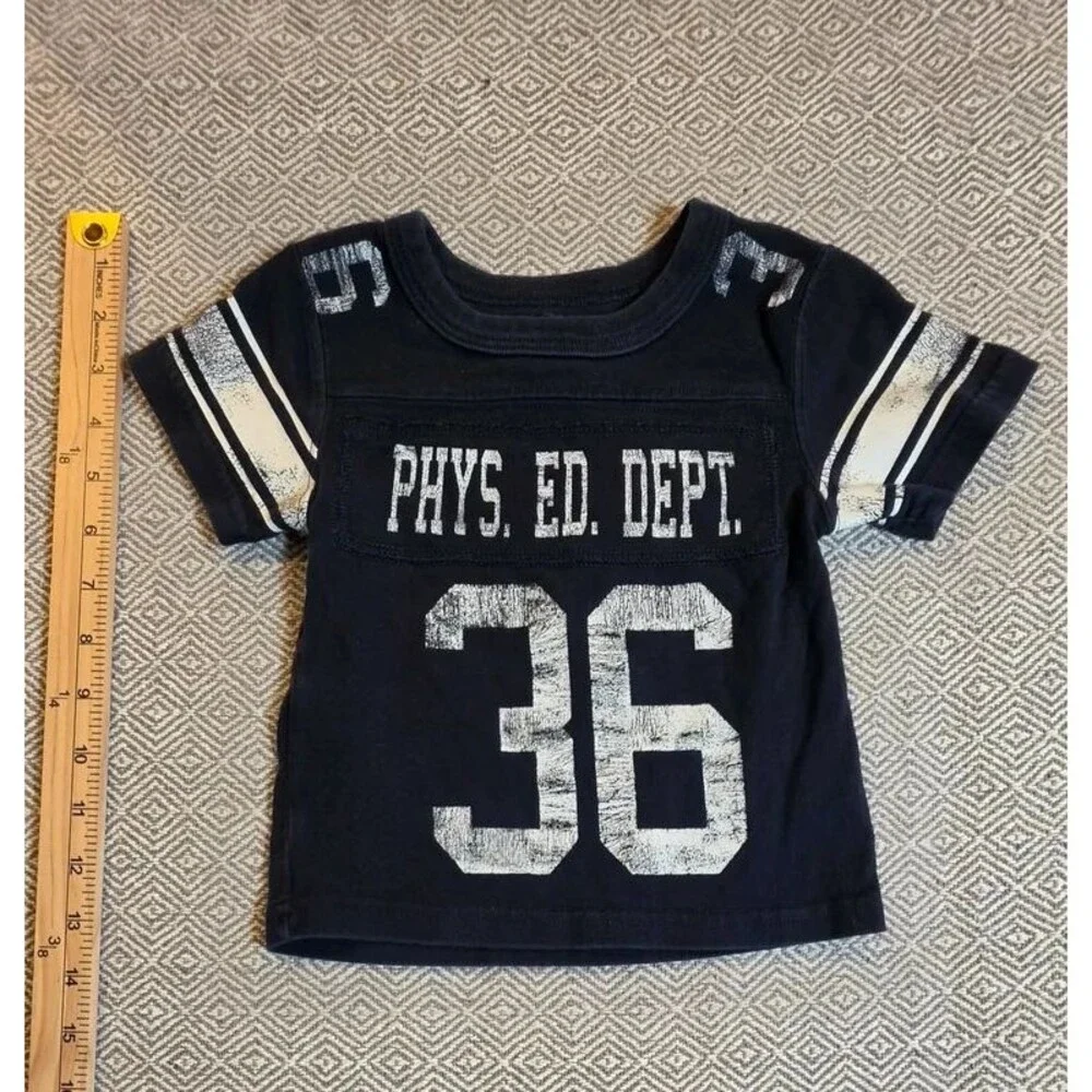 The Children’s Place baby boys’ football-style tee, size 6–9 months